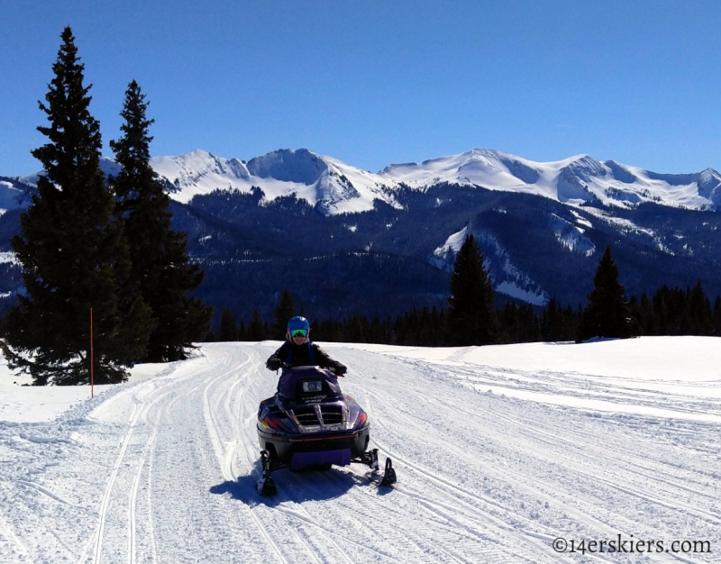 Snowmobiling on easy groomed roads during ACL recovery.