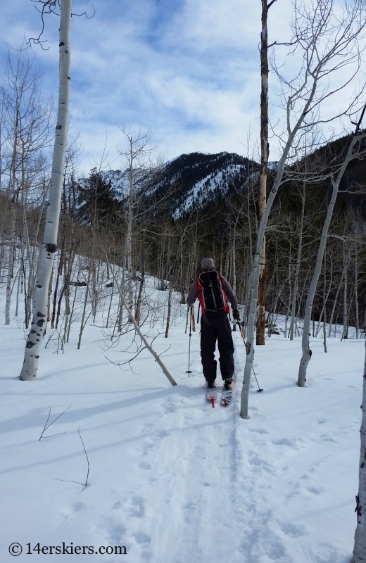 Skinning up Pitkin Creek to go backcountry skiing in the Gore Range. 