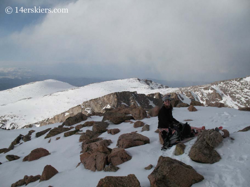 Brittany Konsella on the summit of Mt. Bierstadt getting ready to ski. 