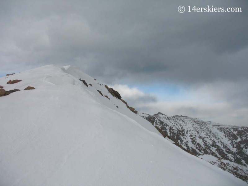 Summit of Mt. Bierstadt with snow. 