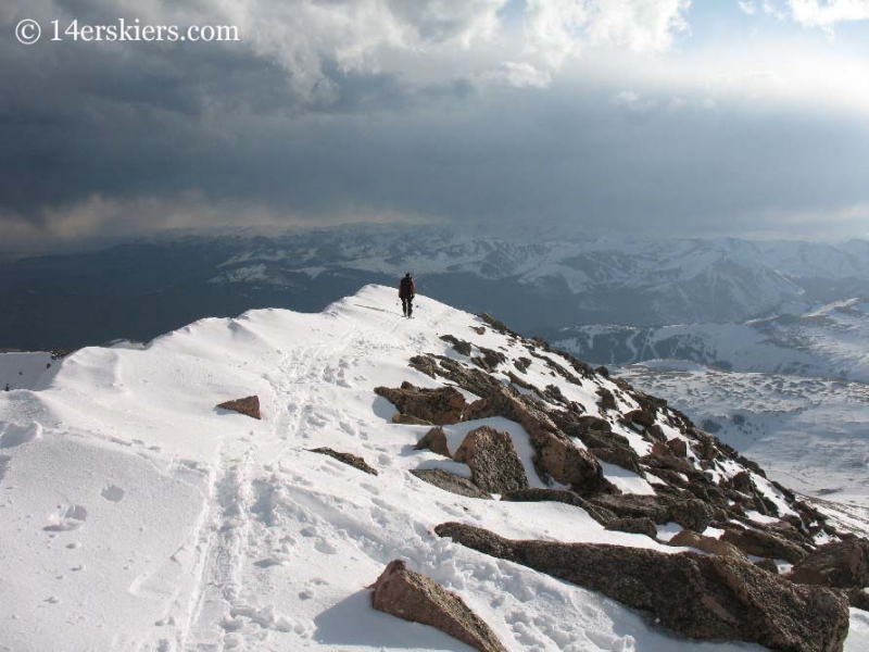 Frank Konsella backcountry skiing off the summit of Mount Bierstadt. 