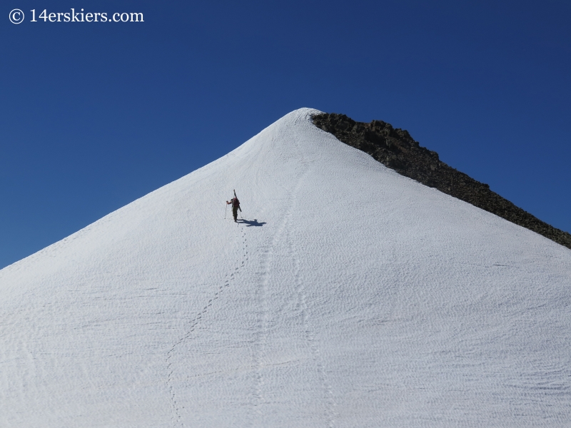 Climbing to the summit of Bonita Peak to go backcountry skiing. 