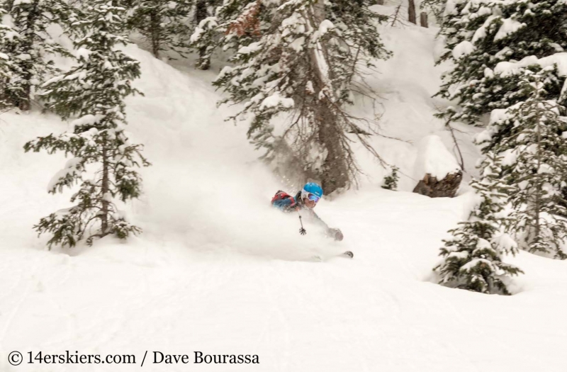 Brittany Konsella getting powder while backcountry skiing in Crested Butte.