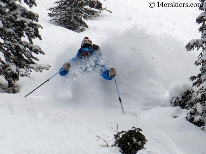 Dave Bourassa getting powder while backcountry skiing in Crested Butte.