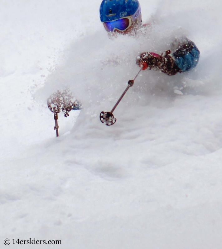 Brittany Konsella getting powder while backcountry skiing in Crested Butte.