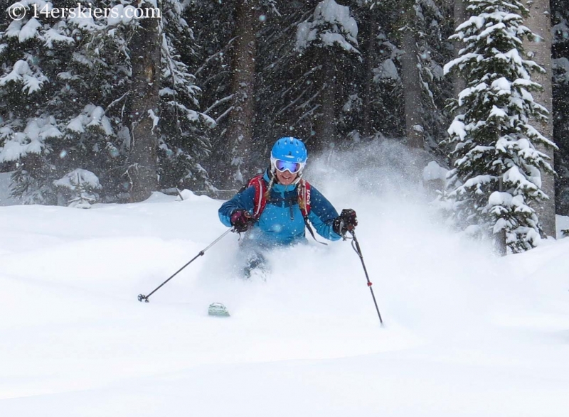 Brittany Konsella getting powder while backcountry skiing in Crested Butte.