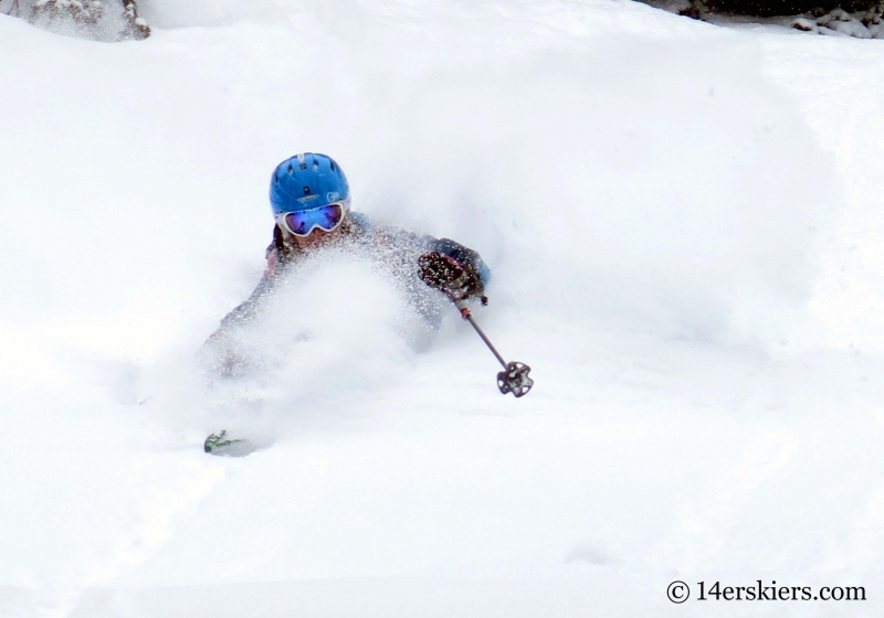 Brittany Konsella getting powder while backcountry skiing in Crested Butte.