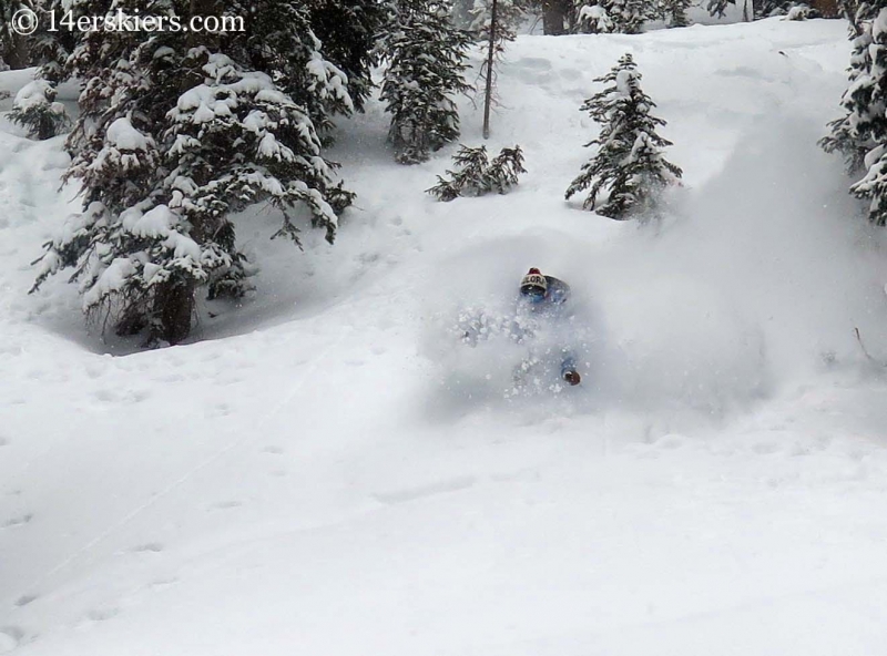 Dave Bourassa getting powder while backcountry skiing in Crested Butte.