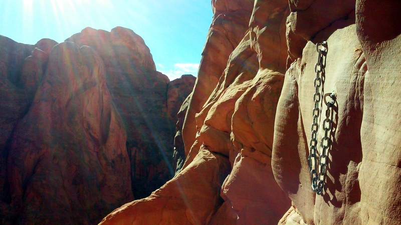 Third rappel on Lost and Found, canyoneering Arches National Park.