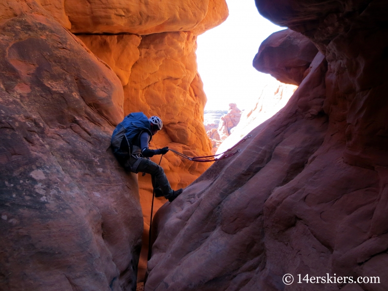 Entrance of 2nd rappel in Lost and Found, canyoneering in Arches National Park