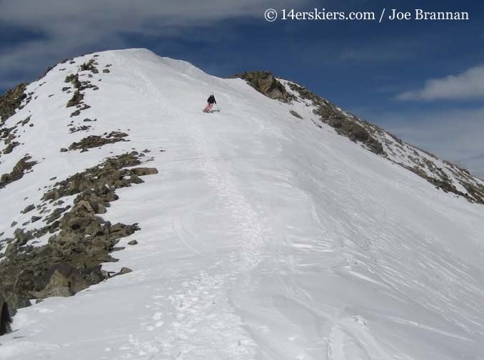 Brittany Walker Konsella skiing from the summit of Mount Columbia. 