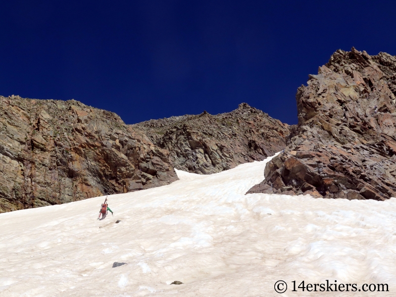 Larry Fontaine climbing Conundrum Couloir to go backcountry skiing. 