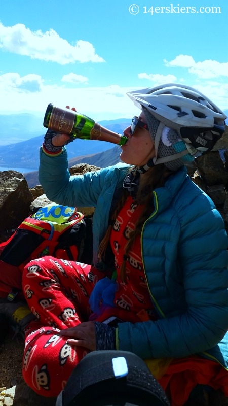 Jessica Martin celebrating on the summit of Mount Elbert. 