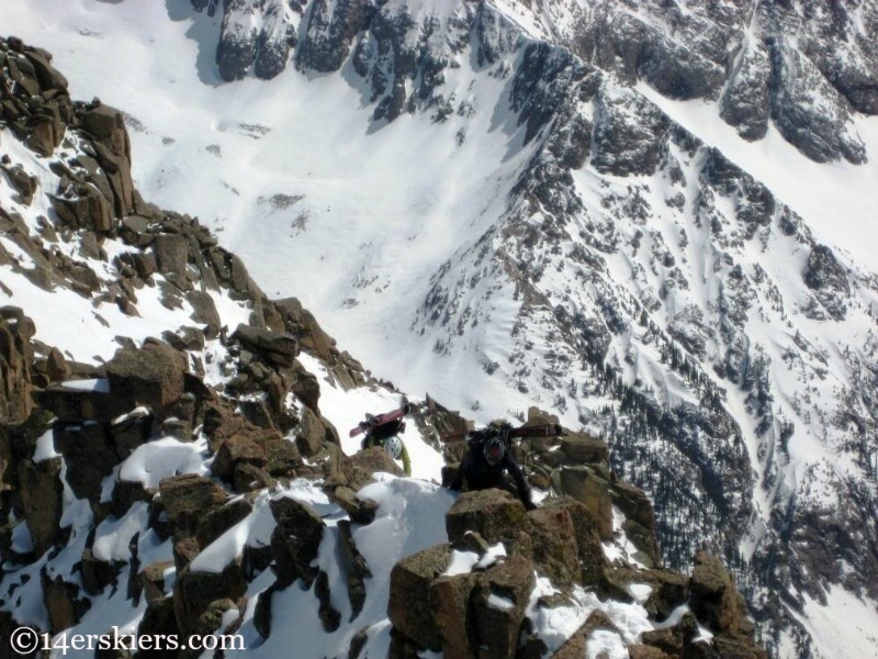 Brittany Walker Konella climing Mount Eolus to go backcountry skiing. 