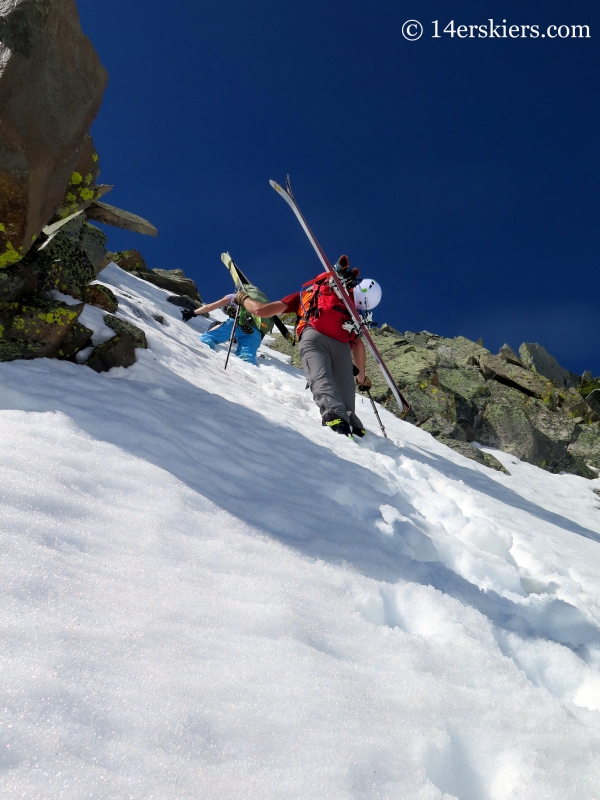 Climbing to go backcountry skiing on Wilson Peak. 