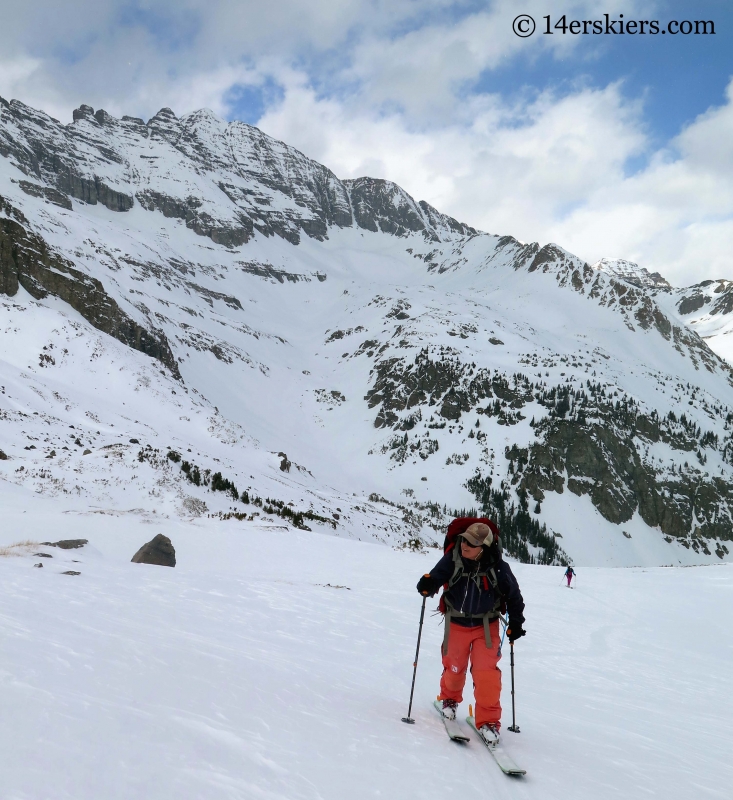 skinning with Castle Peak in background