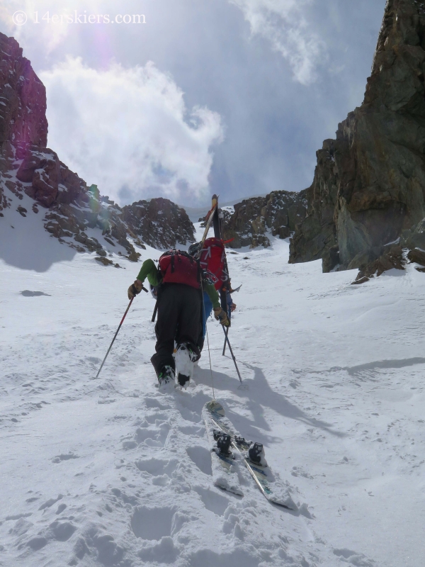 Frank Konsella and Gary Fondl climbing Grizzly couloir to go backcountry skiing. 