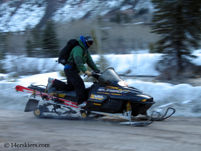 Frank Konsella snowmobiling to Holy Cross