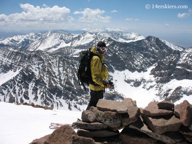 Frank Konsella skiing off summit of Humboldt peak. 