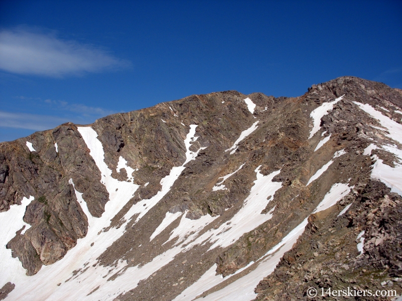 Backcountry skiing Jasper Peak in July.