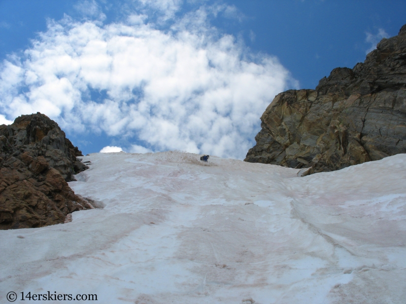 Dave Bourassa backcountry skiing Jasper Peak in July.