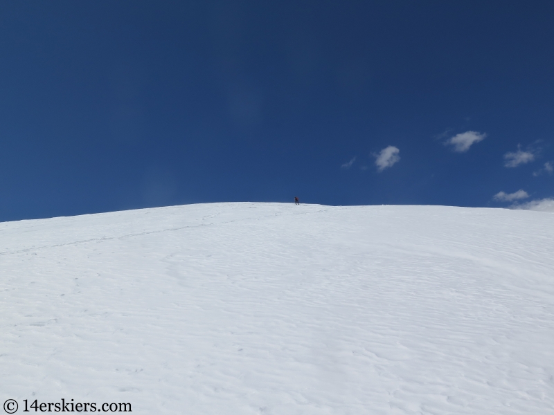 Backcountry skiing Keller Mountain North Couloir in the Gore Range, Colorado. 