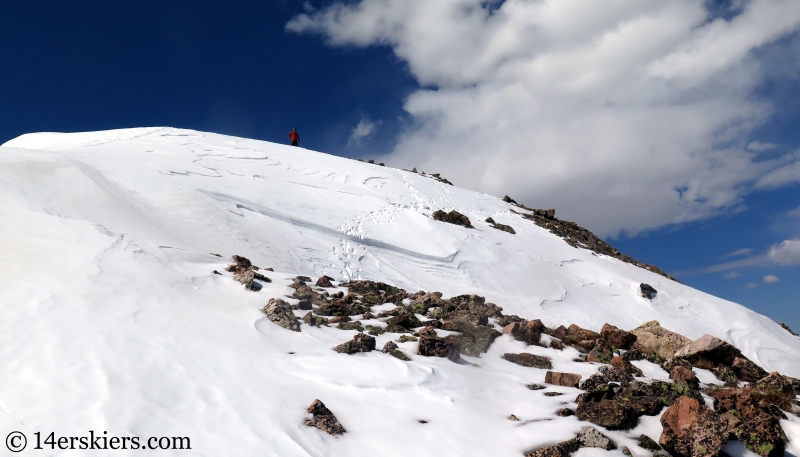 Backcountry skiing Keller Mountain North Couloir in the Gore Range, Colorado. 