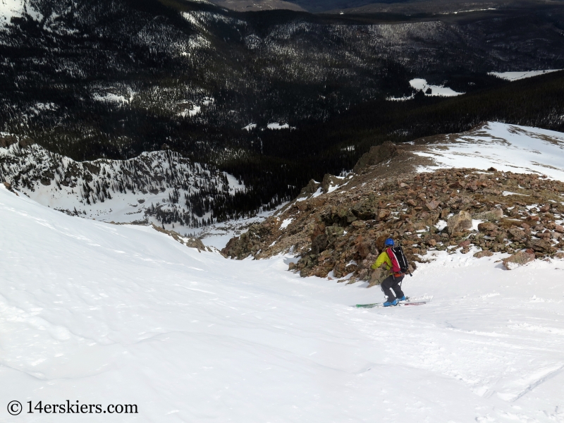 Backcountry skiing Keller Mountain North Couloir in the Gore Range, Colorado.