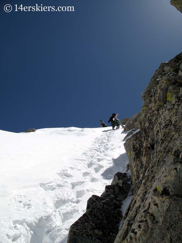 Climbing Mount Lindsey to go backcountry skiing. 