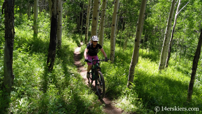 Brittany Konsella mountain biking Snodgrass trail in Crested Butte, CO.