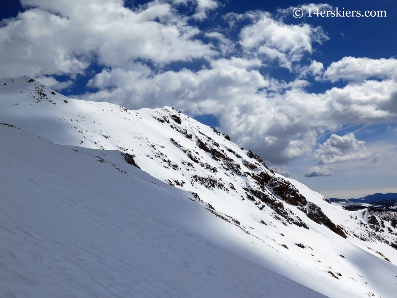 Backcountry skiing on Mount Eva south slopes.