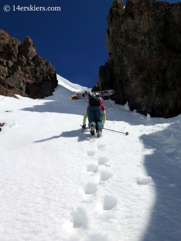 Brittany Konsella climbing a couloir to go backcountry skiing in the Crested Butte backcountry. 