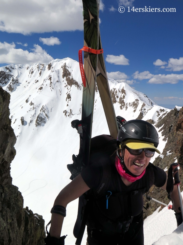 Susan Mol climbing to go backcountry skiing in Crested Butte. 