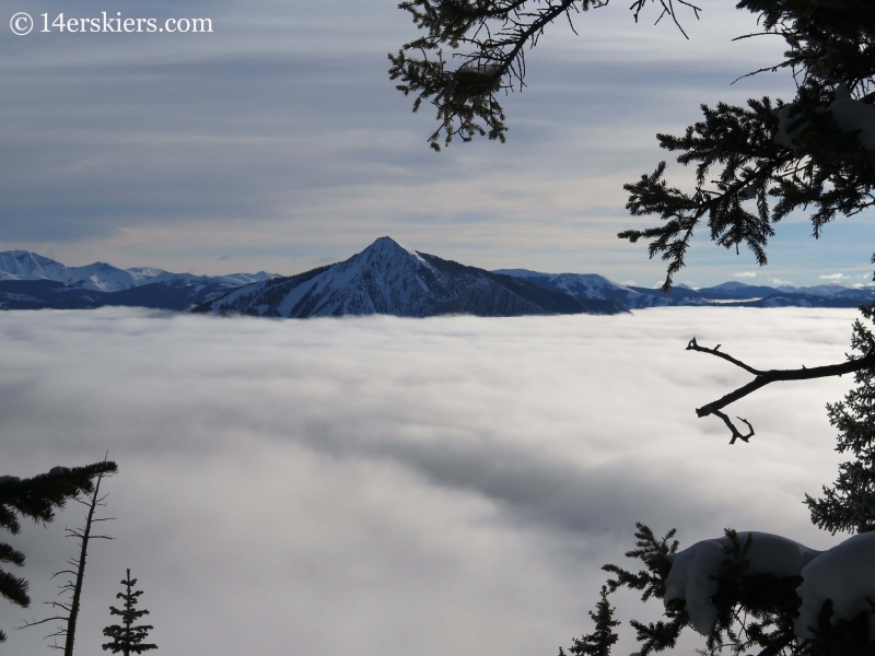 Mount Crested Butte with fog in winter while backcountry skiing