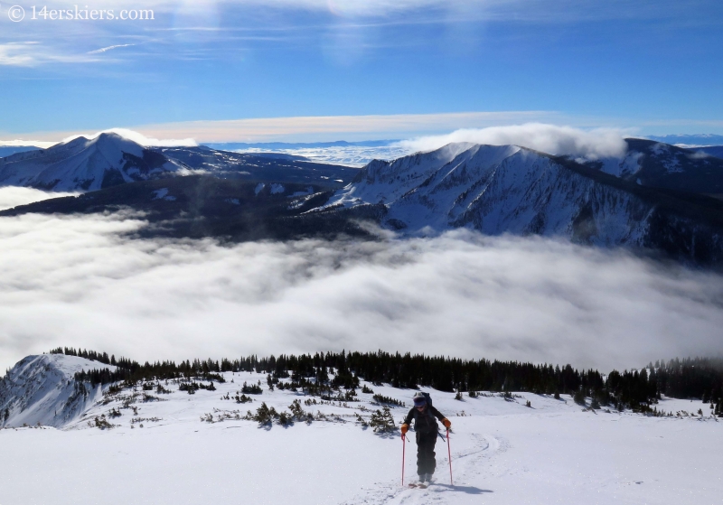 Alex Riedman skinning while backcountry skiing in Crested Butte. 