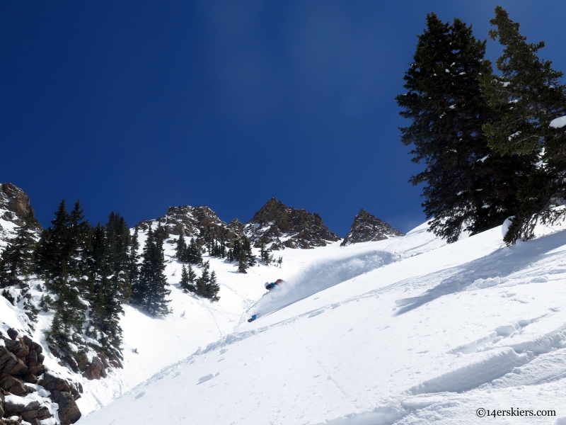 ski skiers point near vail