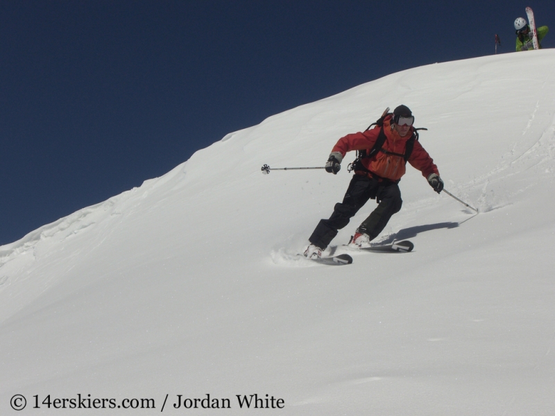 Frank Konsella backcountry skiing on Sunshine Peak. 