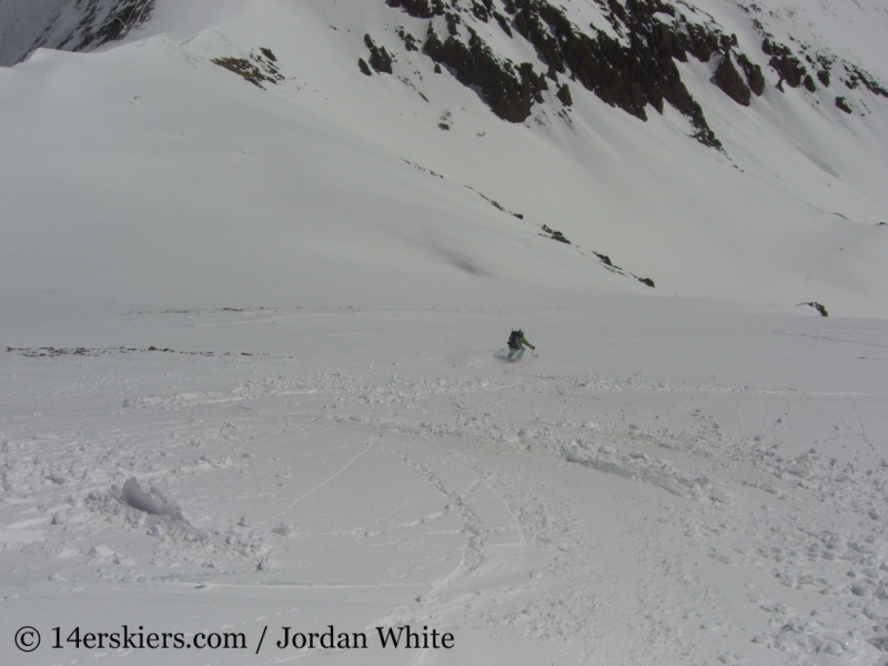 Brittany Walker Konsella backcountry skiing on Sunshine Peak. 