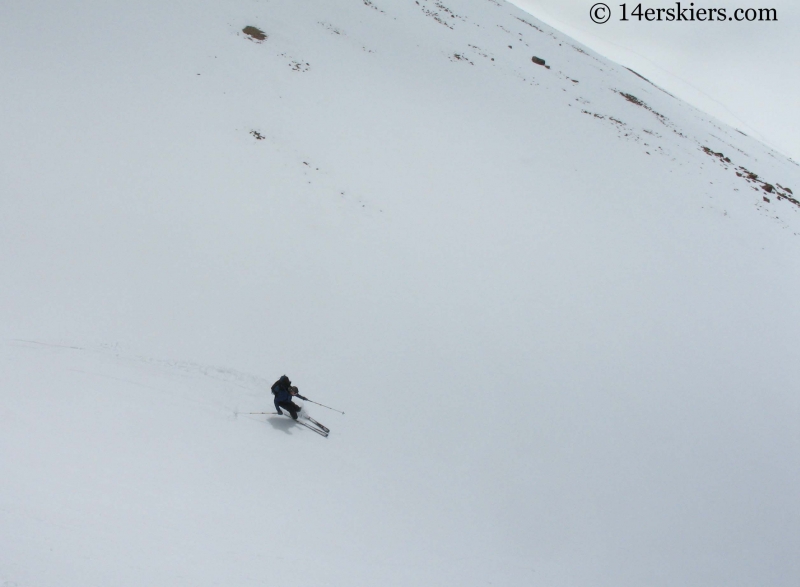 Jordan White backcountry skiing on Redcloud Peak.