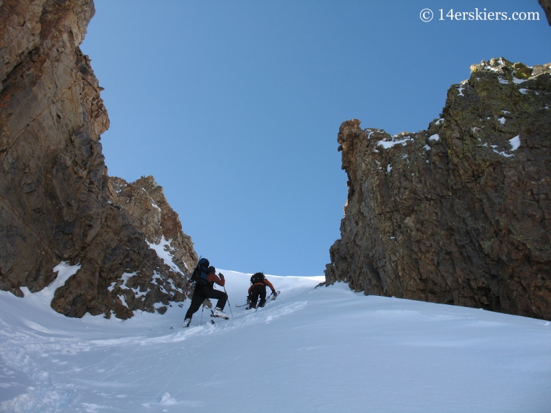 Climbing a couloir to ascend Sunshine Peak.