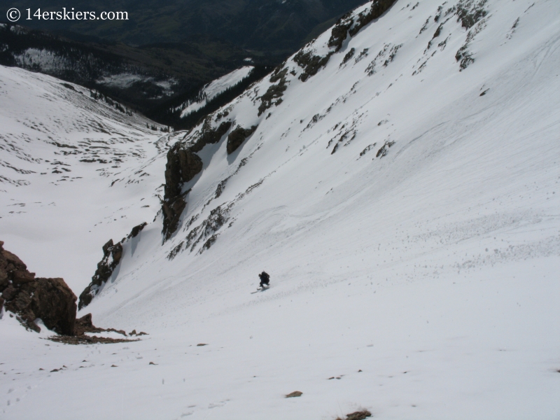 Jordan White backcountry skiing on Sunshine Peak.