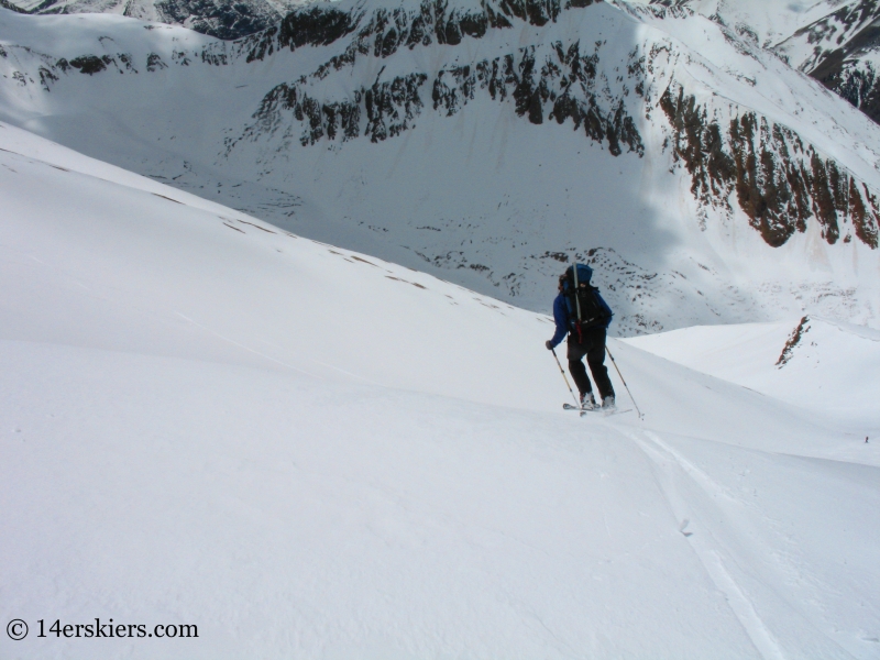 Jordan White backcountry skiing on Redcloud Peak. 
