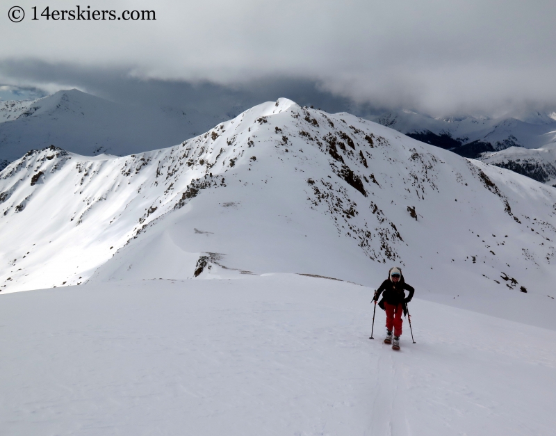 Jenny Veilleux skiining to go backcountry skiing on Twining Peak. 