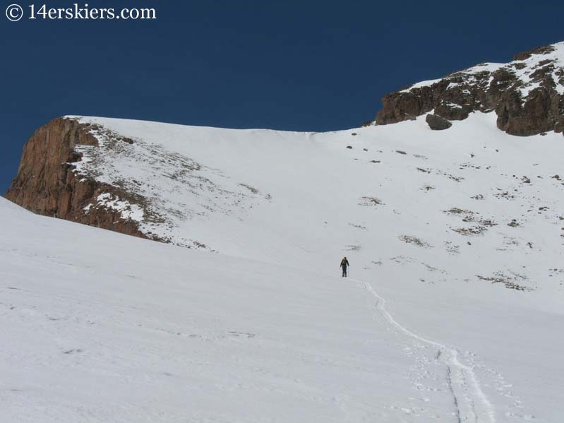 Skinning up east side of Uncompahgre Peak to go backcountry skiing. 