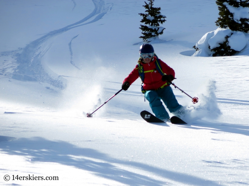 Brittany Konsella backcountry skiing on Wolf Creek Passl