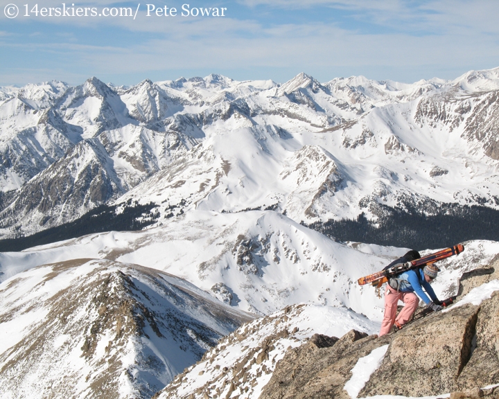 Brittany Konsella climbing mount Yale to go backcountry skiing