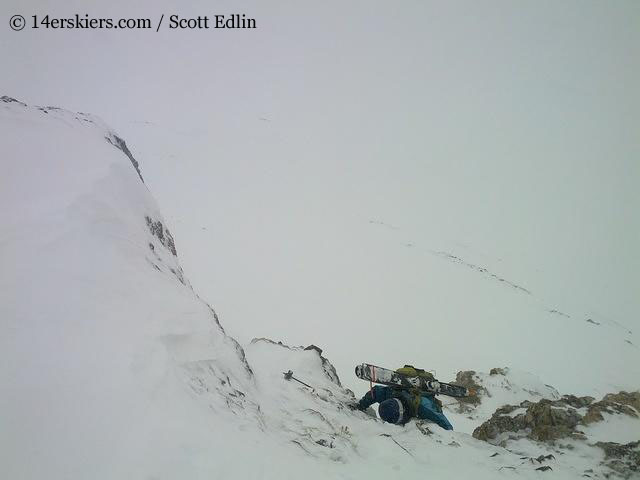 Brittany Konsella climbing to go backcountry skiing on Square Top.
