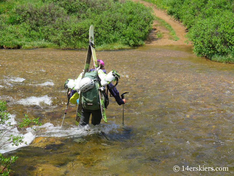 Natalia Moran crossing stream. 